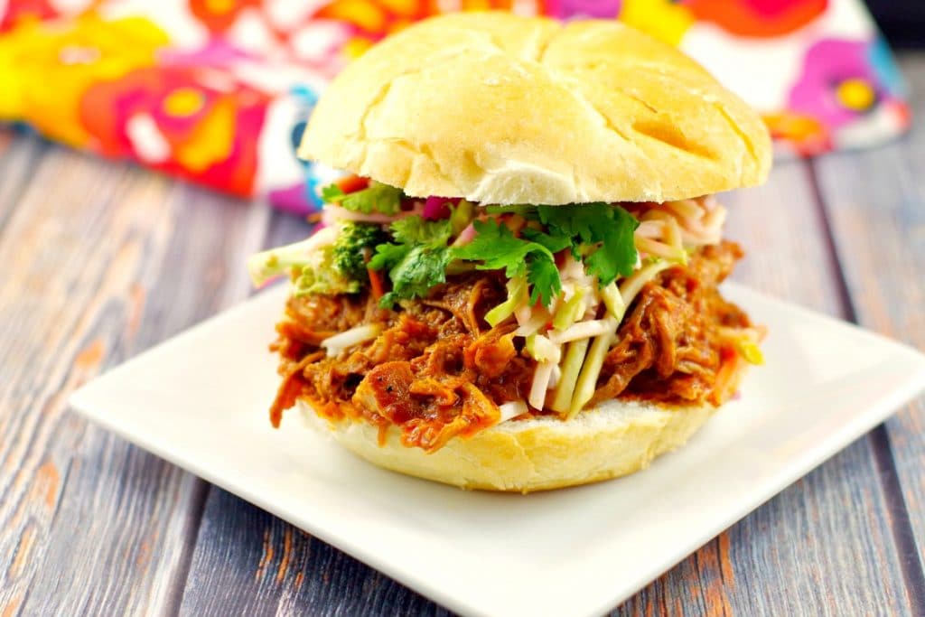 Slow Cooker Pulled Pork on a bun | #crockpotpulledpork- Foodmeanderings.com