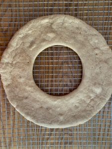 gingerbread cookie wreath on large cooling rack