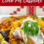 Ukrainian Crock Pot Casserole being held up on a spoon over a dish of more casserole.