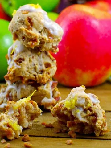 award-winning apple pie cookies stacked with apples in background