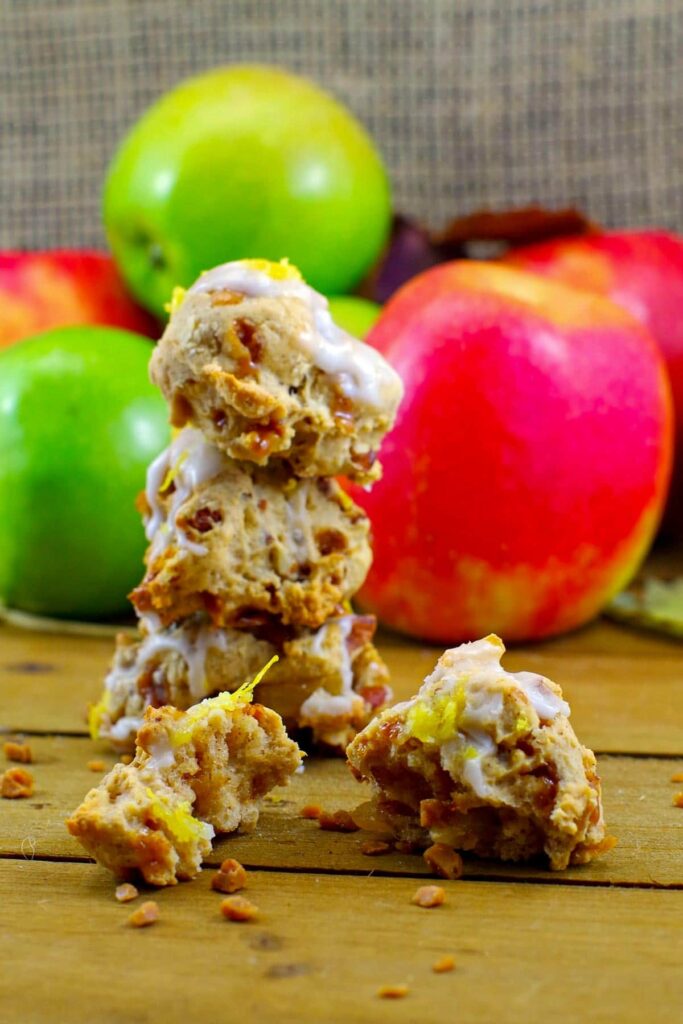 award-winning apple pie cookies stacked with apples in background