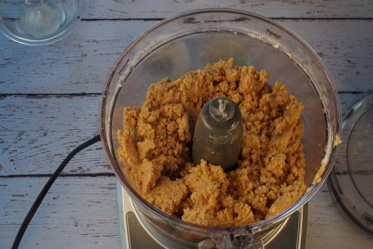 Base ingredients mixed together in the bowl of a food processor.