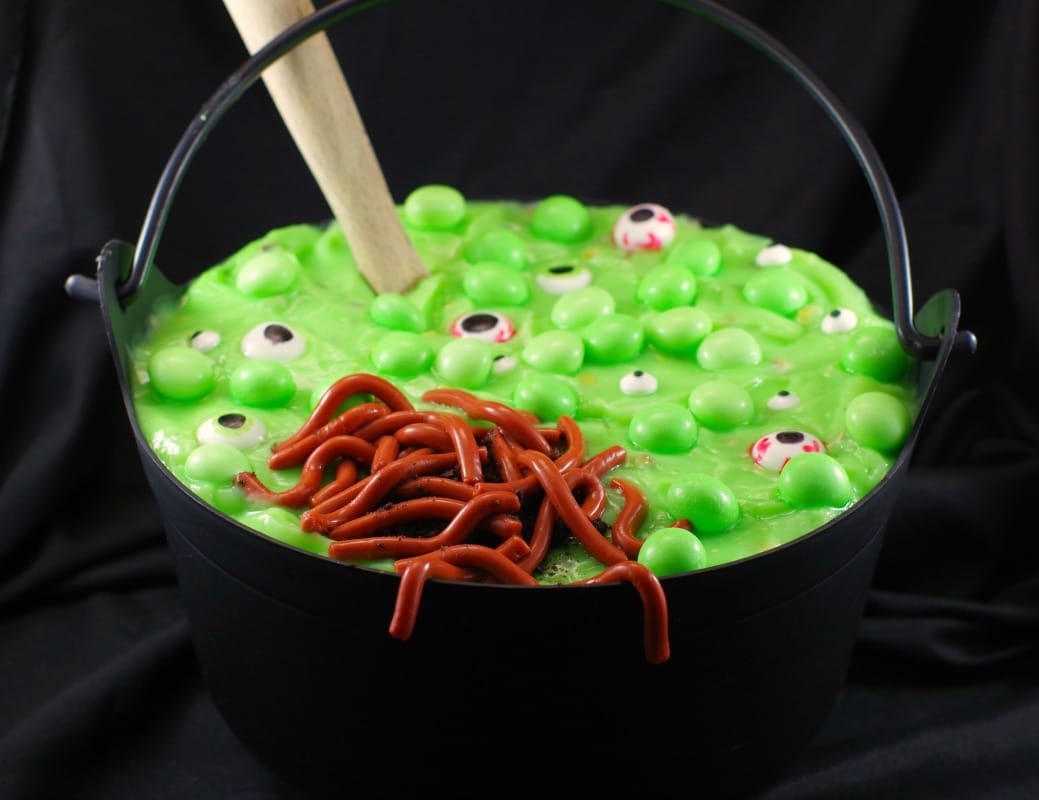 witches brew spumoni trifle in a black plastic cauldron with jello worms