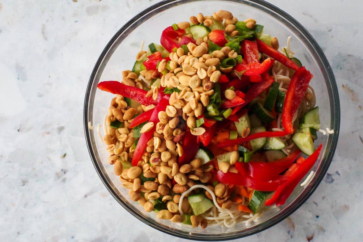 Cooked pasta with vegetables and peanuts