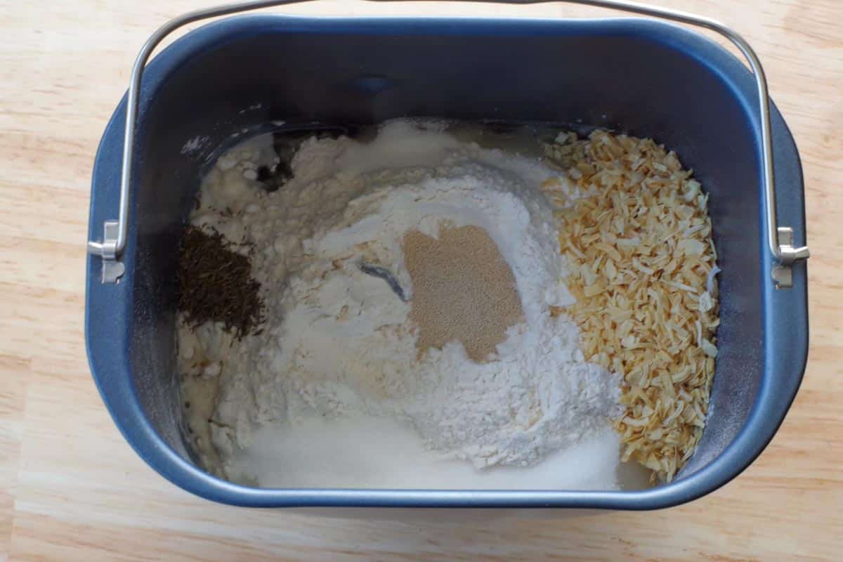 yeast added to dry ingredients (in a crater) in bread pan