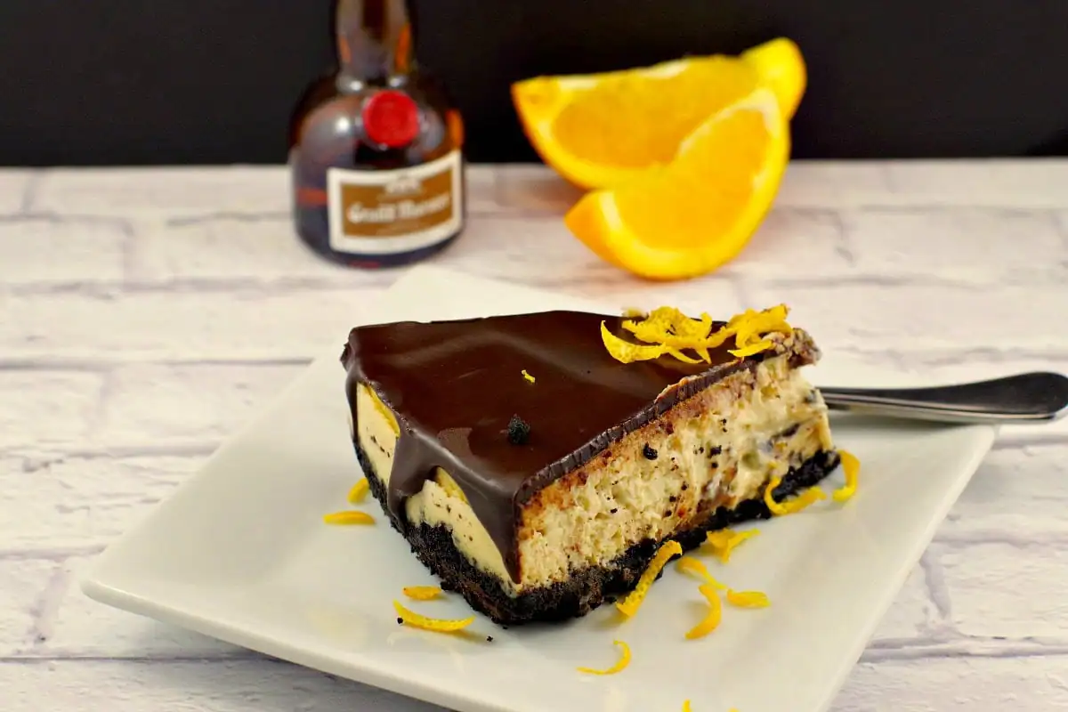 Baked Grand Marnier Cheesecake | with chocolate glaze - foodmeanderings.com