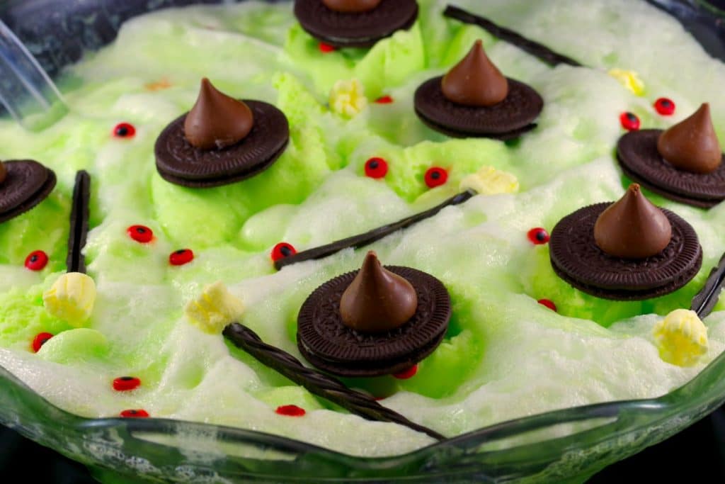 Halloween punch for kids | melting witch - with cookie witch hats, licorice brooms and candy eyes