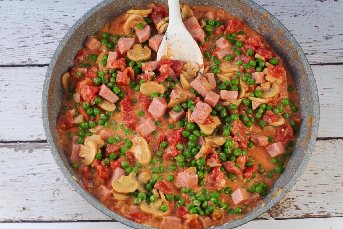 peas and mushrooms added to ham mixture