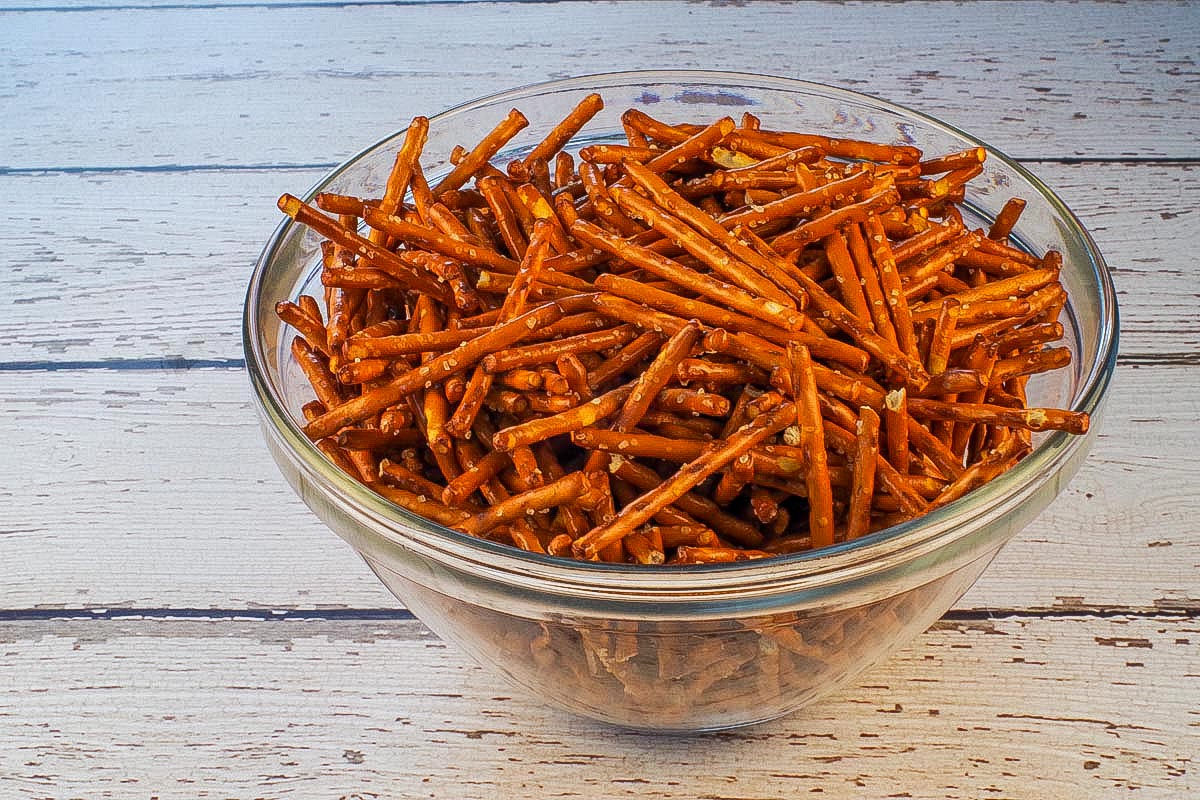 pretzel sticks in a glass bowl