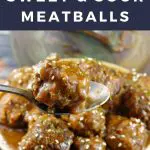 Pinterest Pin with text at top and bottom and photo of crock-pot sweet and sour meatballs being held up on a spoon