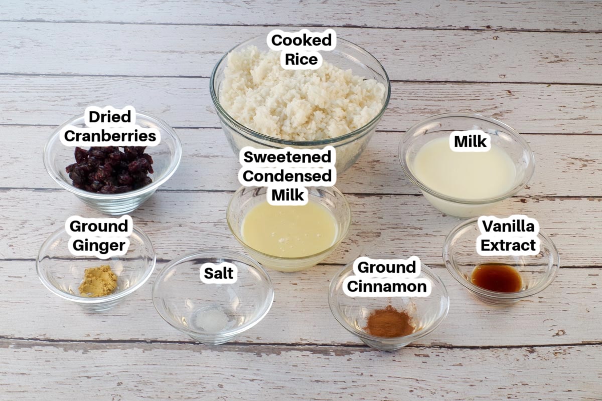 Ingredients in Cranberry Rice Pudding in glass bowls, labelled.