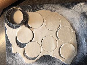 Chinese potstickers assembly - cut dough into 3 inch circles
