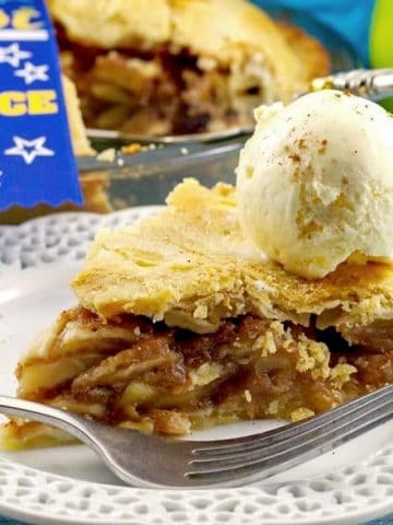 A piece of Deluxe apple pie with ice cream | award-winning apple pie