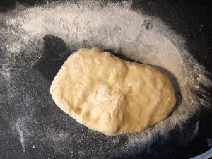 Dough on cutting board