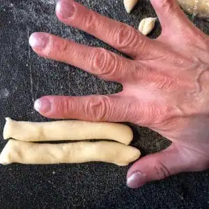 Thickness of dough compared to finger