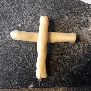 Dough in 2 strips shaped like a cross