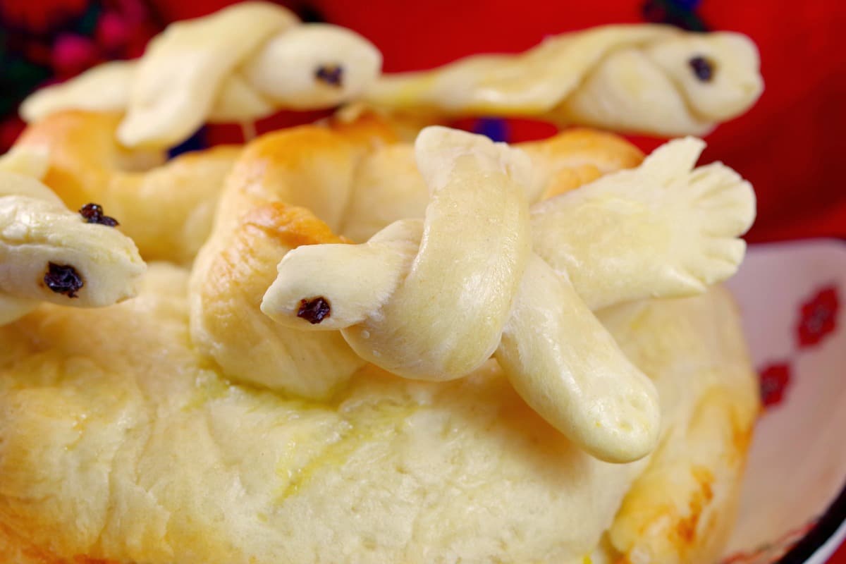 close up of edible Ukrainian Easter bread Dove used to decorate paska bread (sitting on bread)