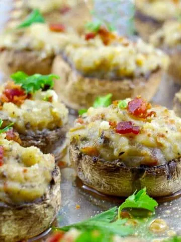 easy pierogi stuffed mushrooms on a baking sheet covered with foil