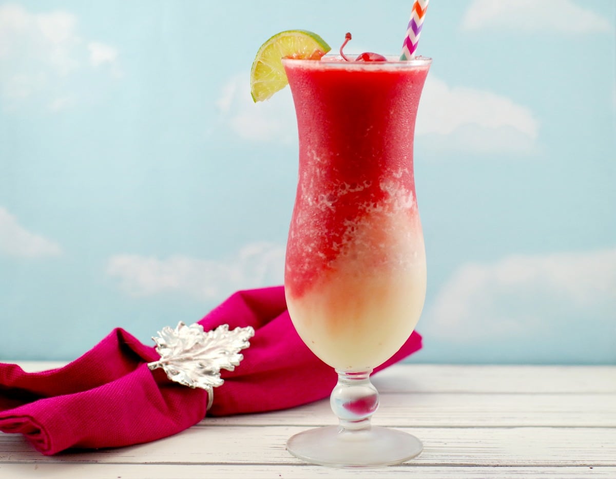 Miami Vice mocktail with red napkin with Canadian Maple Leaf in background