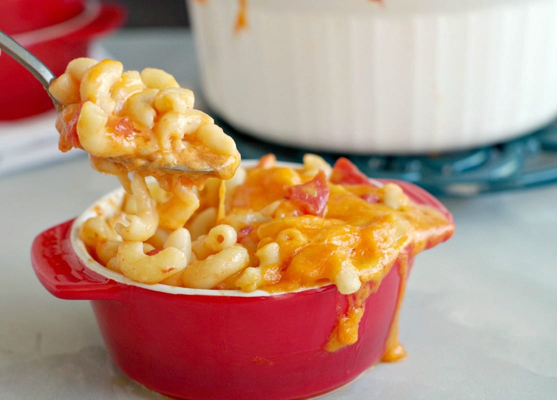 Students mix foot shavings with grated cheese