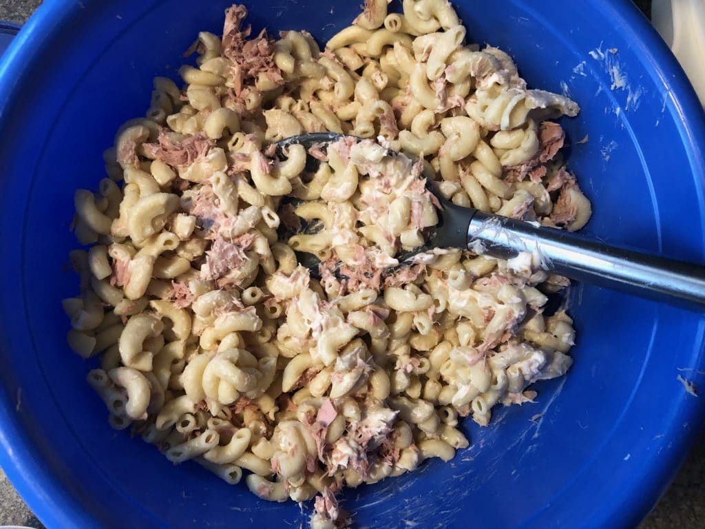 tuna mixed with mayonnaise in a bowl