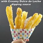 Churros in carnival style colored polka dot paper holder