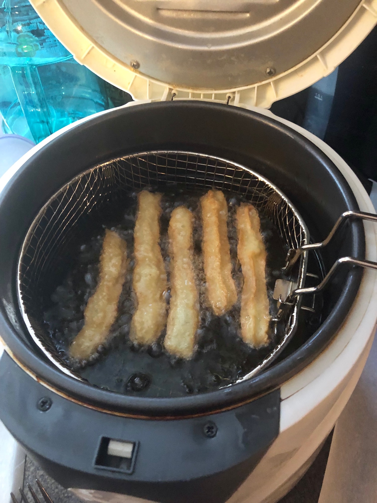 churros being deep-fried