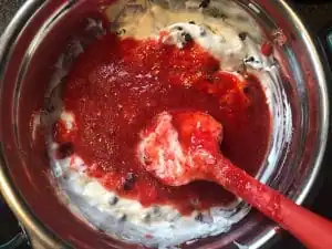 Mixture of strawberries, yogurt, agave and mini chocolate chips