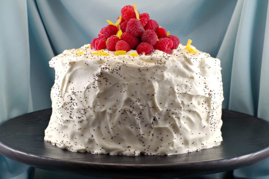 Lemon Poppy Seed cake on black display