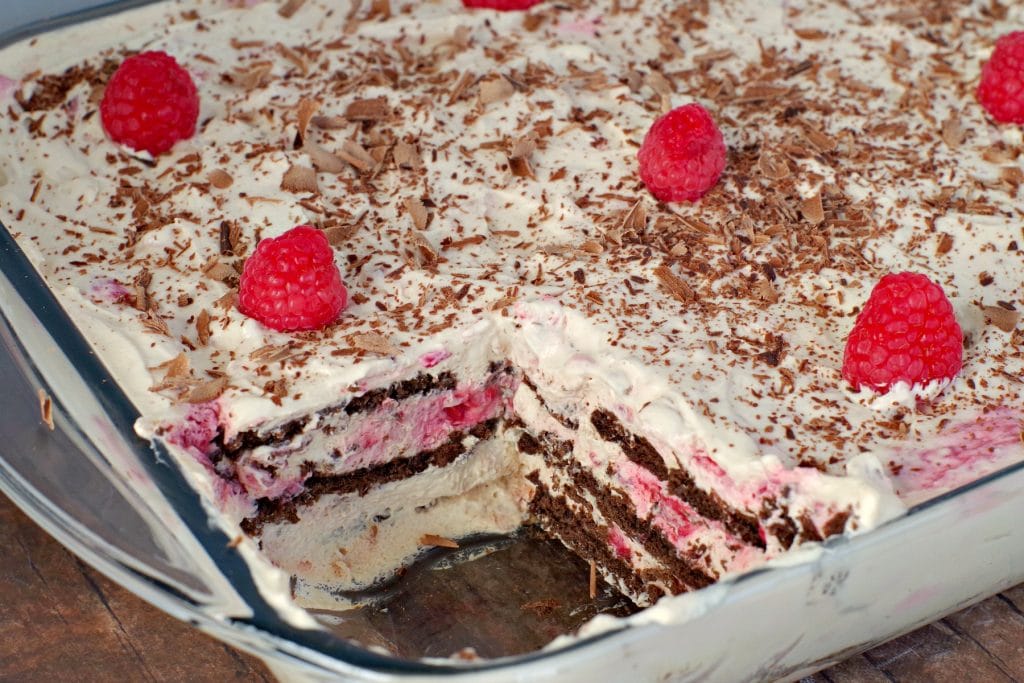 Raspberry Icebox cake with piece missing