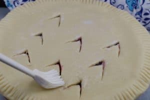 Pie Brushed with milk, using pastry brush