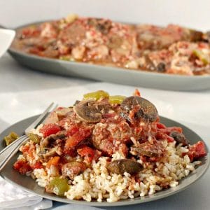 Slow Cooker Swiss Steak on Rice (on green plate)