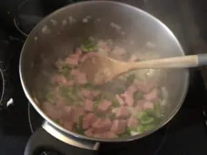 ham, onion and garlic simmering