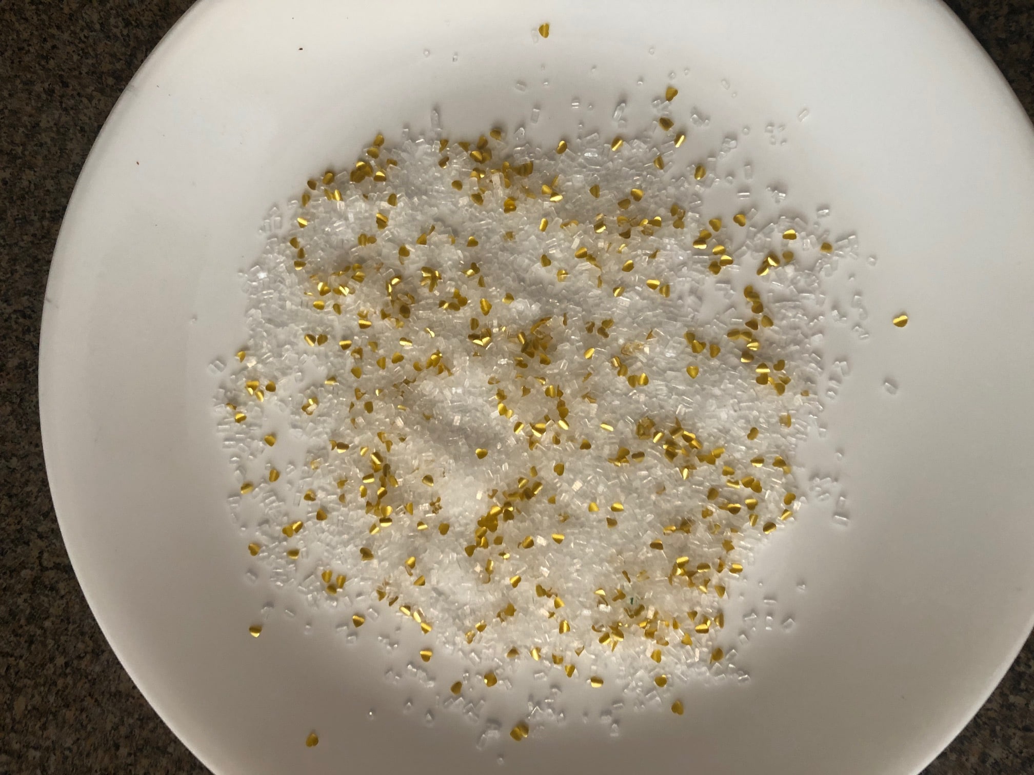 plate with sparkling sugar and edible glitter