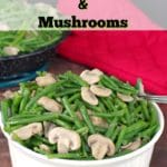 green beans and mushrooms in a white round casserole dish