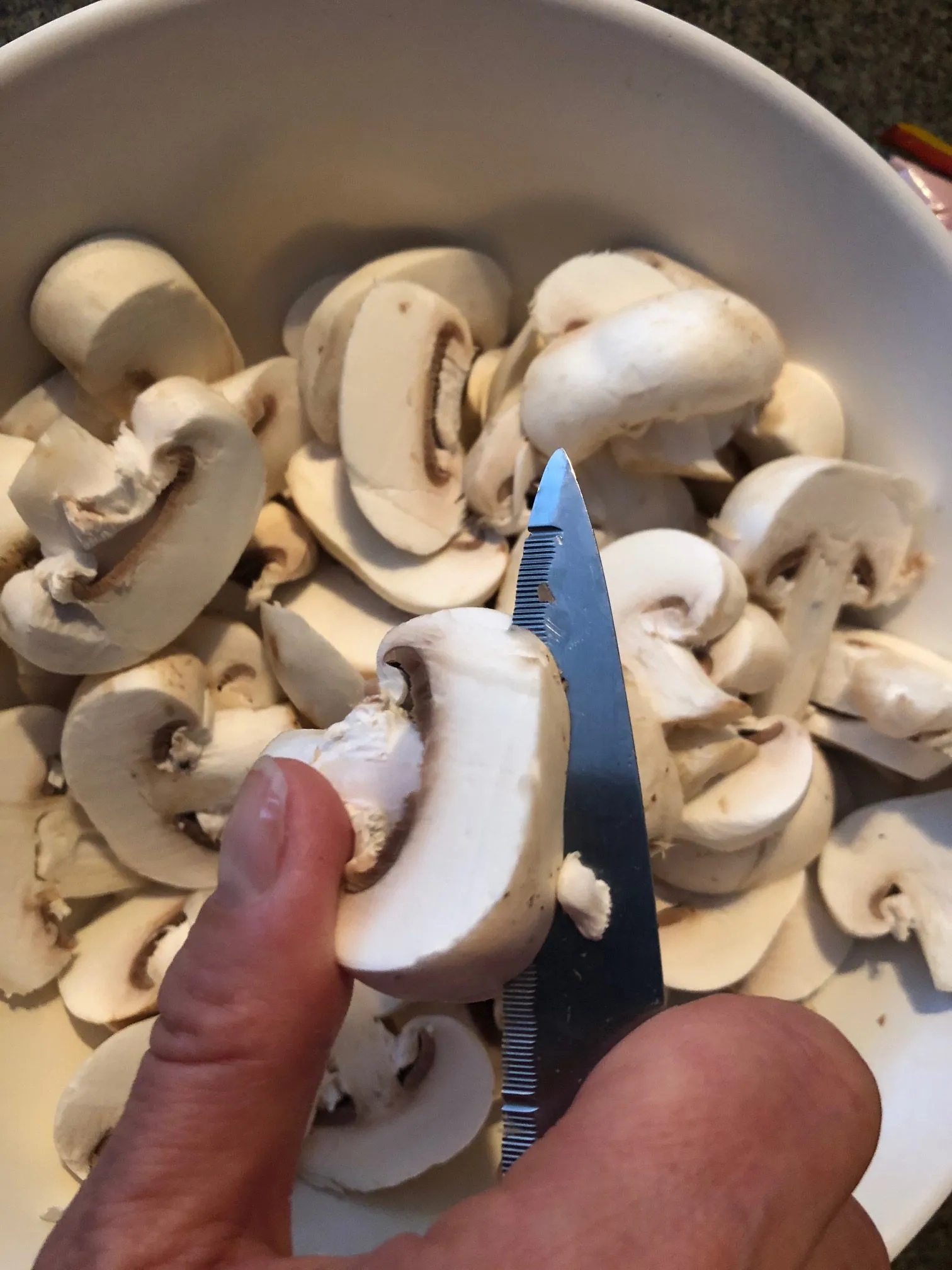 mushrooms being sliced