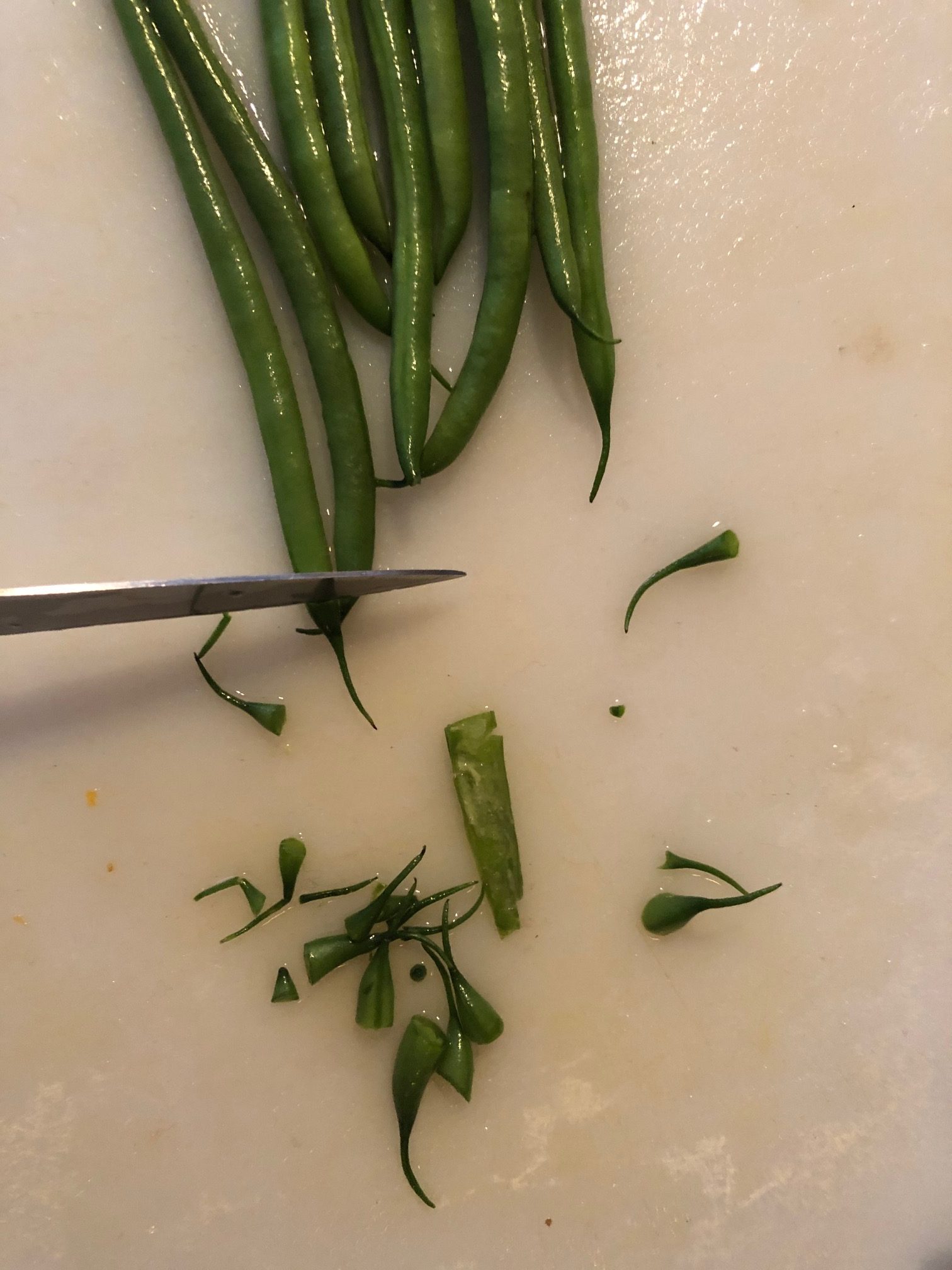 beans with stringy ends being cut off
