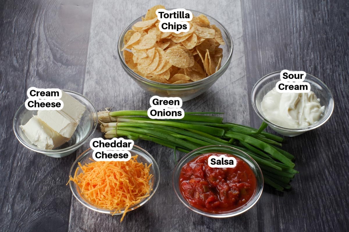 nacho dip ingredients in glass bowls, labelled