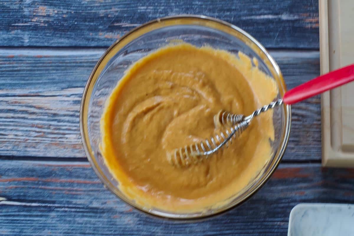 wet ingredients mixed together with whisk in a medium glass bowl