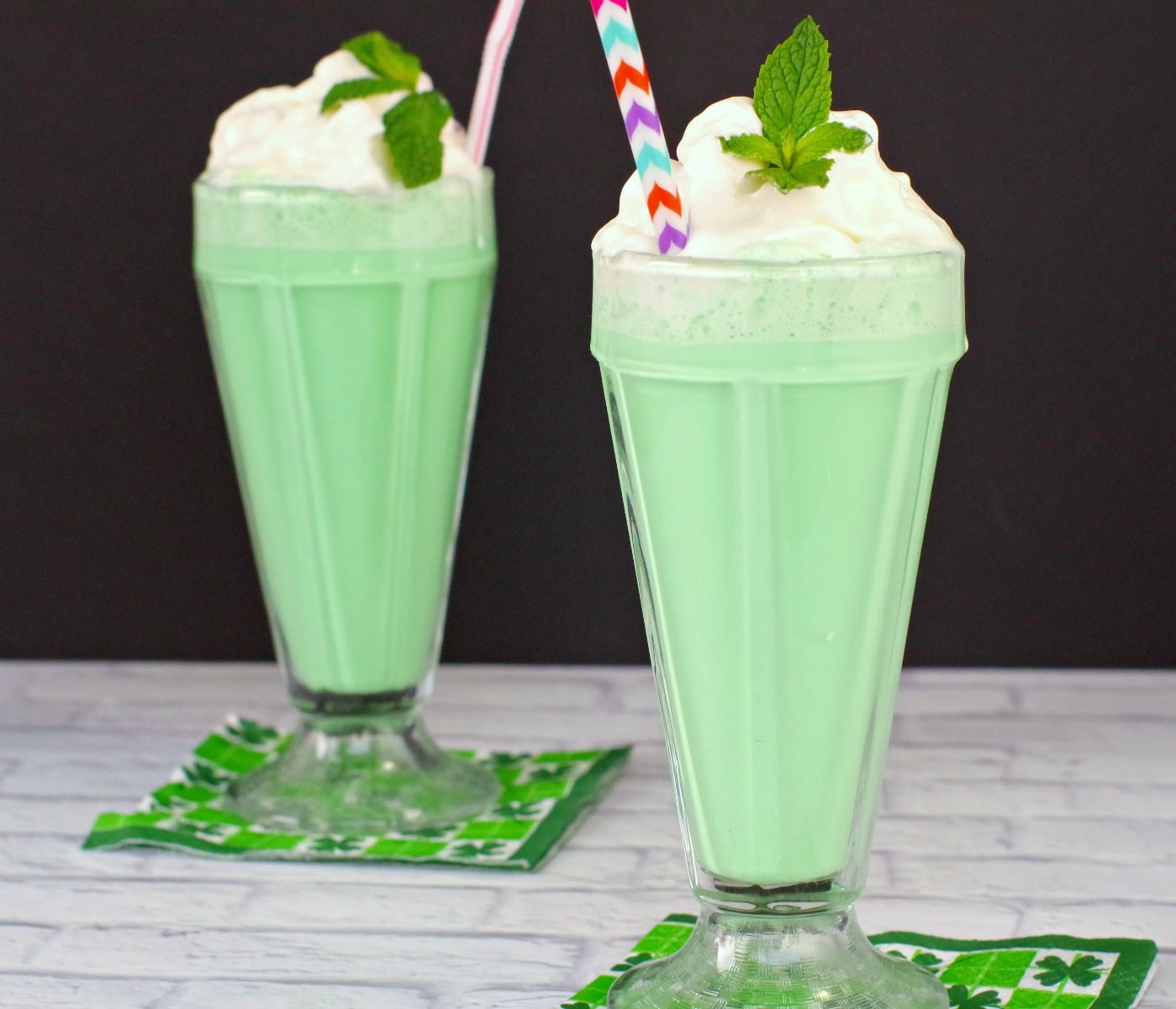 2 grasshopper mocktails on shamrock napkins