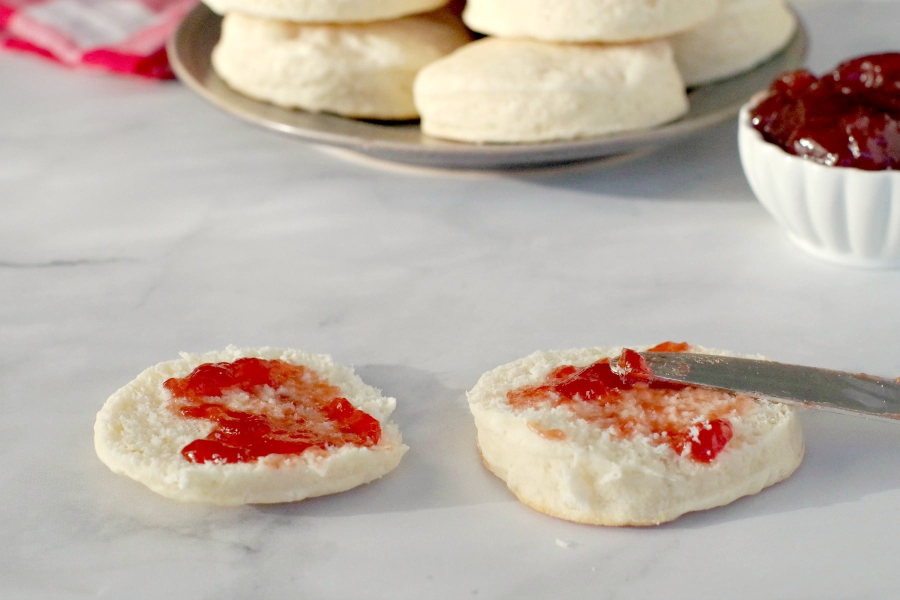 baking powder biscuit with jam on it