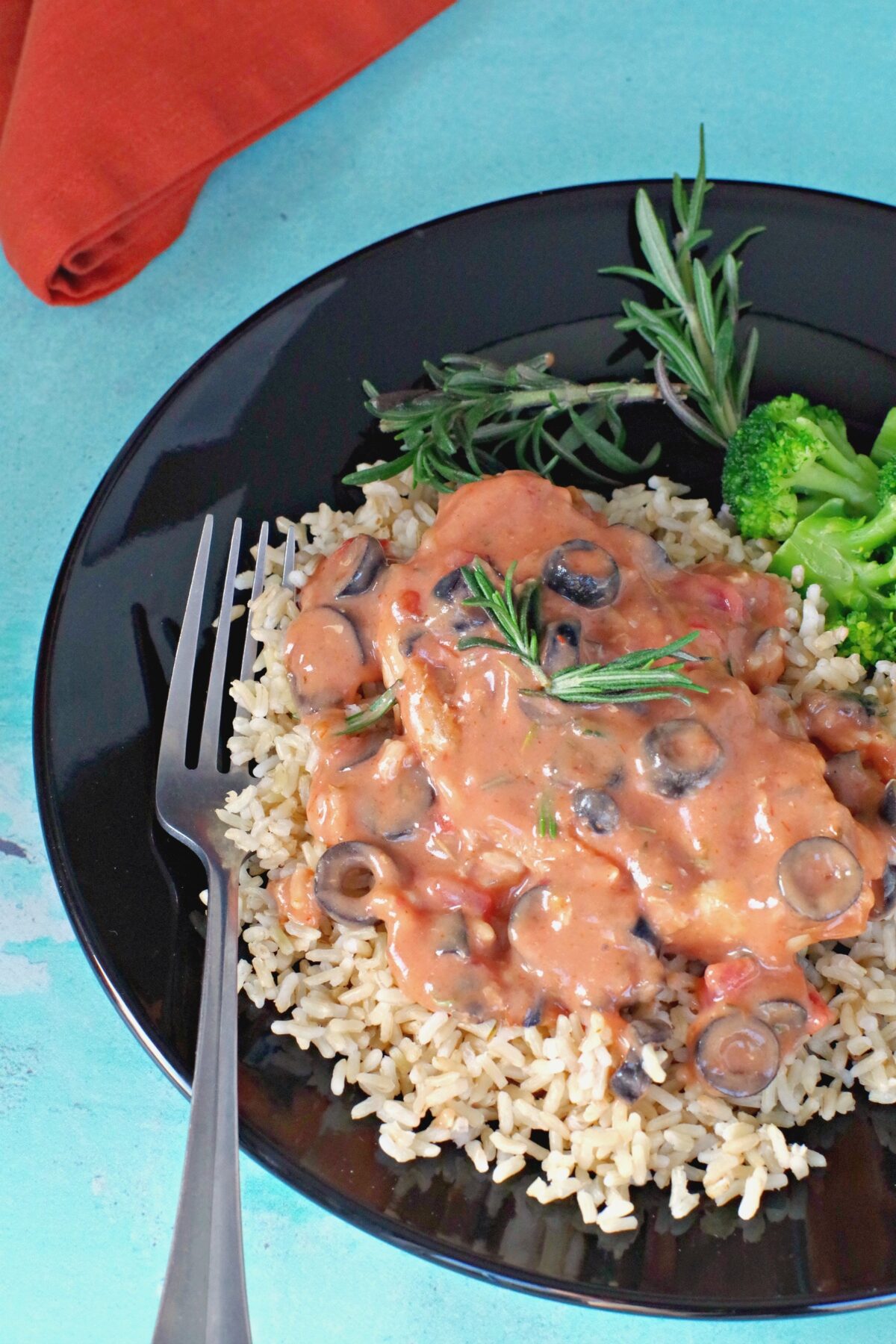 Pork with Creamy mushroom salsa sauce on bed of rice with frozen broccoli