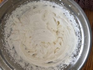 whipping cream whipped to stiff peaks