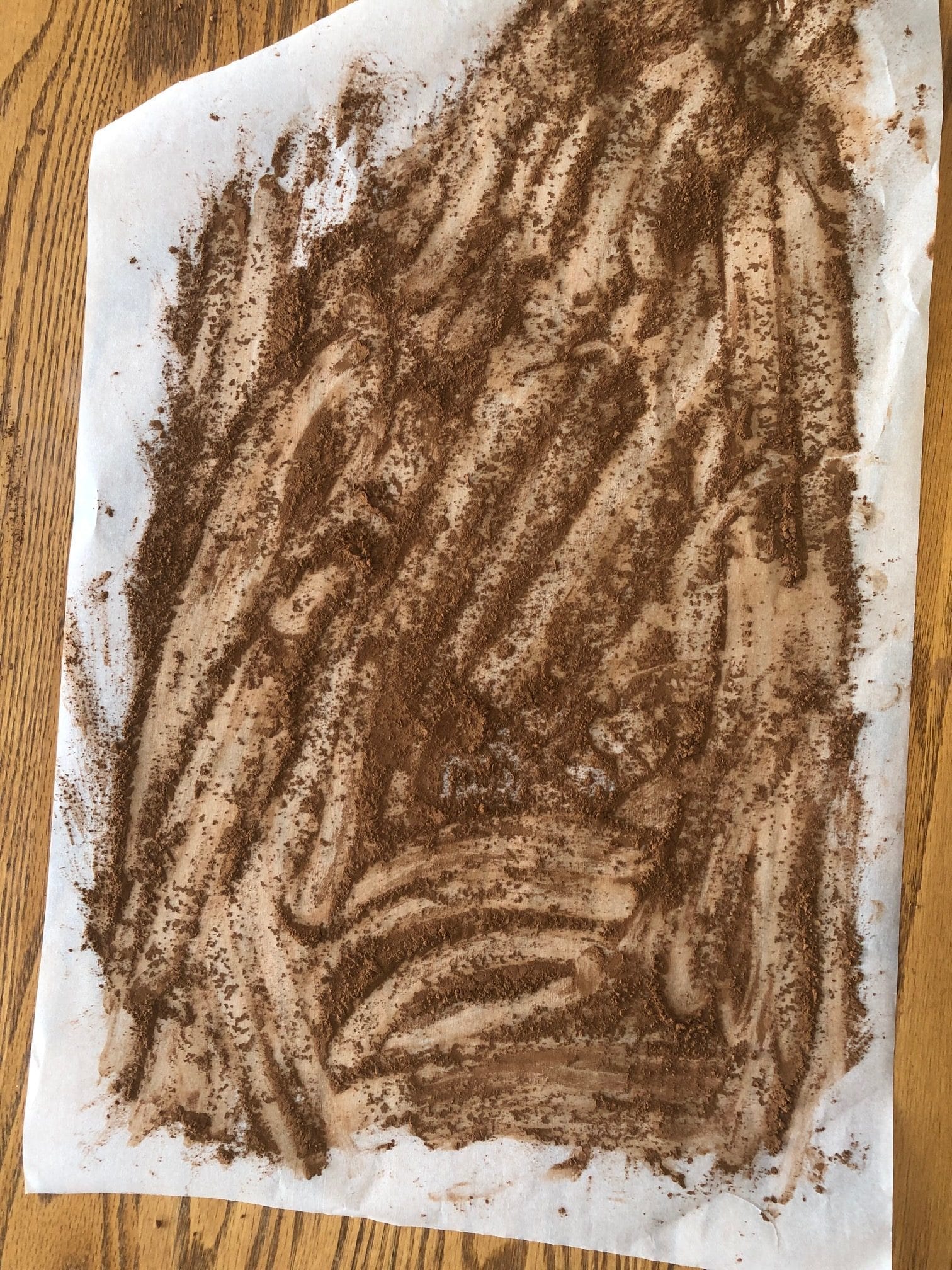 cocoa sprinkled on parchment