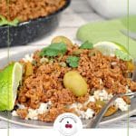 Pinterest pin with text on bottom and photo of picadillo on rice and pan of picadillo and dish of rice in the background