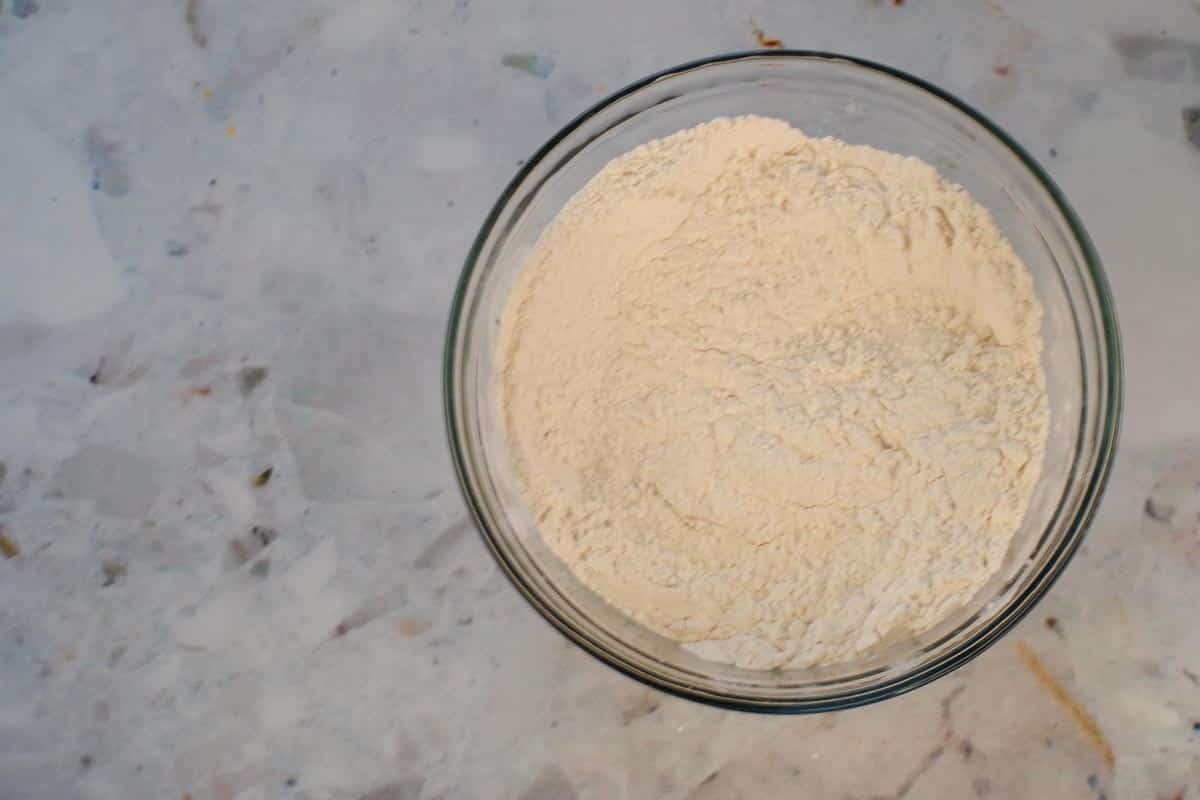 Dry ingredients sifted together in medium glass bowl.