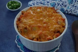 baked carrot casserole in white casserole dish