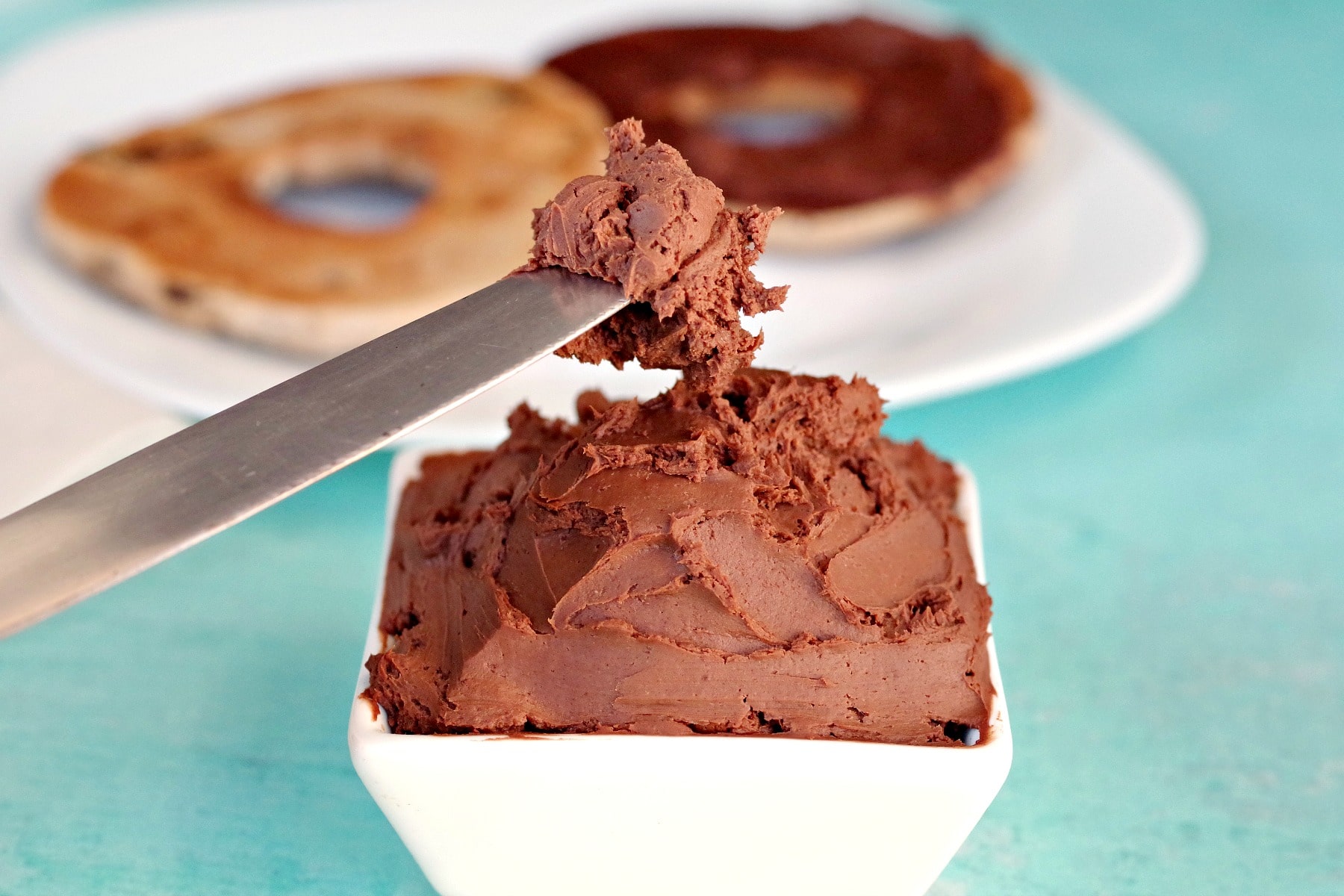 knife with chocolate cream cheese on it