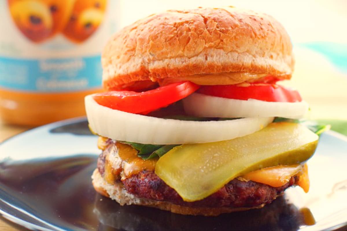 peanut butter burger on a black plate