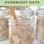 Bananas foster overnight oats in jar with spoon and cinnamon stick with more jars in background